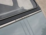 a close up of a car door with the word citroen on it