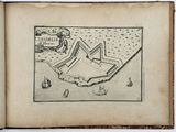 an old book with a drawing of a castle on top of it