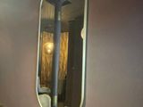 a bathroom with a sink and a mirror on the wall
