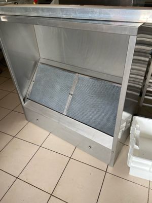 a stainless steel refridgerator in a commercial kitchen