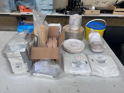 a table with a lot of items on it that are sitting on a table