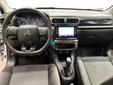 the interior of a car with a steering wheel, dashboard, and dash board