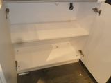 an image of a white cupboard with shelves in it