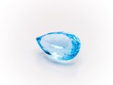 a blue topazte gems on a white background