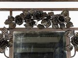 a mirror that has a bunch of flowers on it