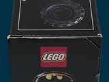 lego batman logo on a black box with a blue background