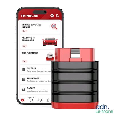 an image of a red and black car scanner next to a phone