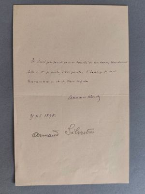un gros plan d'un morceau de papier sur lequel on a écrit