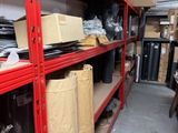 a room with a lot of boxes and boxes on the shelves
