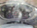 a car dashboard with a speedometer and gauges in it