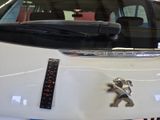 a close up of a car with a sticker on it