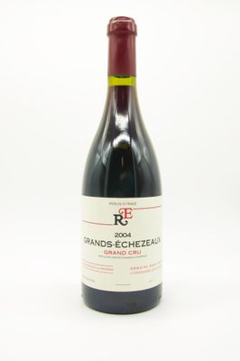 a bottle of wine that is sitting on a table