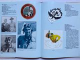 an open book with pictures of people and animals on it