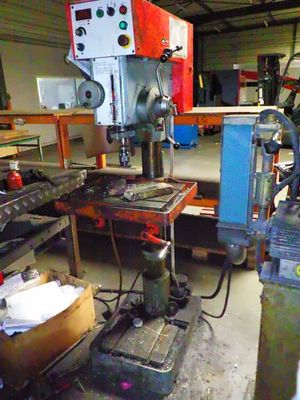 a picture of a machine shop with a lot of tools