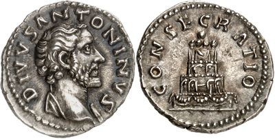 a silver coin with an image of a man and a castle on it