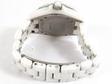 an image of a wrist watch with a white bracelet on a white surface