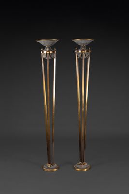pair of art deco candlesticks in the manner of person