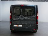 an image of a black van parked in a garage