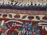 a close up view of a rug with a cat laying on it