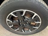 a close up of a tire on a vehicle