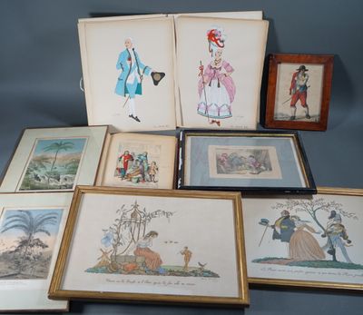 several framed and unframed drawings of people and animals on a table