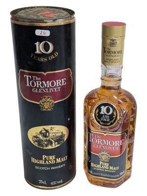 an image of a bottle of turmmore and a canister of whisky