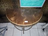 a table that has a sign on it on the floor