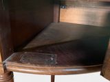 a close up of a wooden table with a black top