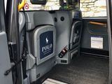 a small van with a ramp in the back of it