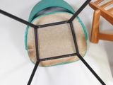 a chair that has a seat on it and a chair that has a seat on it