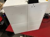 an image of a white refrigerator in a room