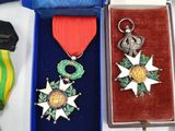 several medals and medals are displayed in a blue case