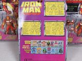 many different action figures in the display case