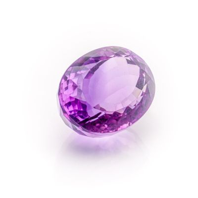 a purple amethorate gems on a white background