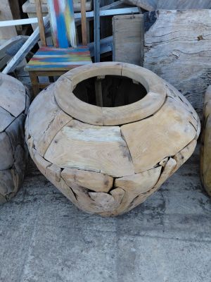 several pieces of wood are stacked on top of each other