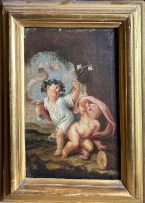 painting of two cherensils in a gold frame on a wall