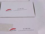 three boxes of pizza sitting on top of a white table