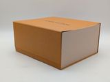 an image of a brown box with a white lid on a white background