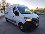 a picture of a white van parked in a parking lot