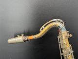 a saxophone that is sitting on top of a table