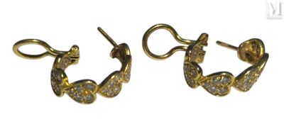 two pairs of gold and diamond hoop earrings on a white background