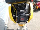 a small engine attached to the side of a building
