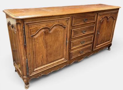 an old wooden sideboard with drawers and drawers on it