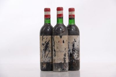 three bottles of wine sit on a table with a white background