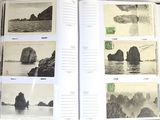 a open book with pictures of rocks in the water