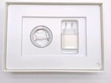 a picture of a white box with a charger on it