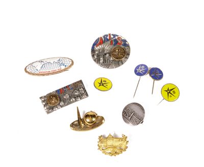 a lot of pins that are on a white surface