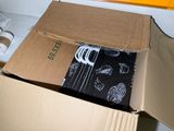 a cardboard box with a black and white pattern on it