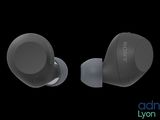 a pair of earphones sitting on top of each other