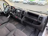 a view of the inside of a truck from the driver ' s seat